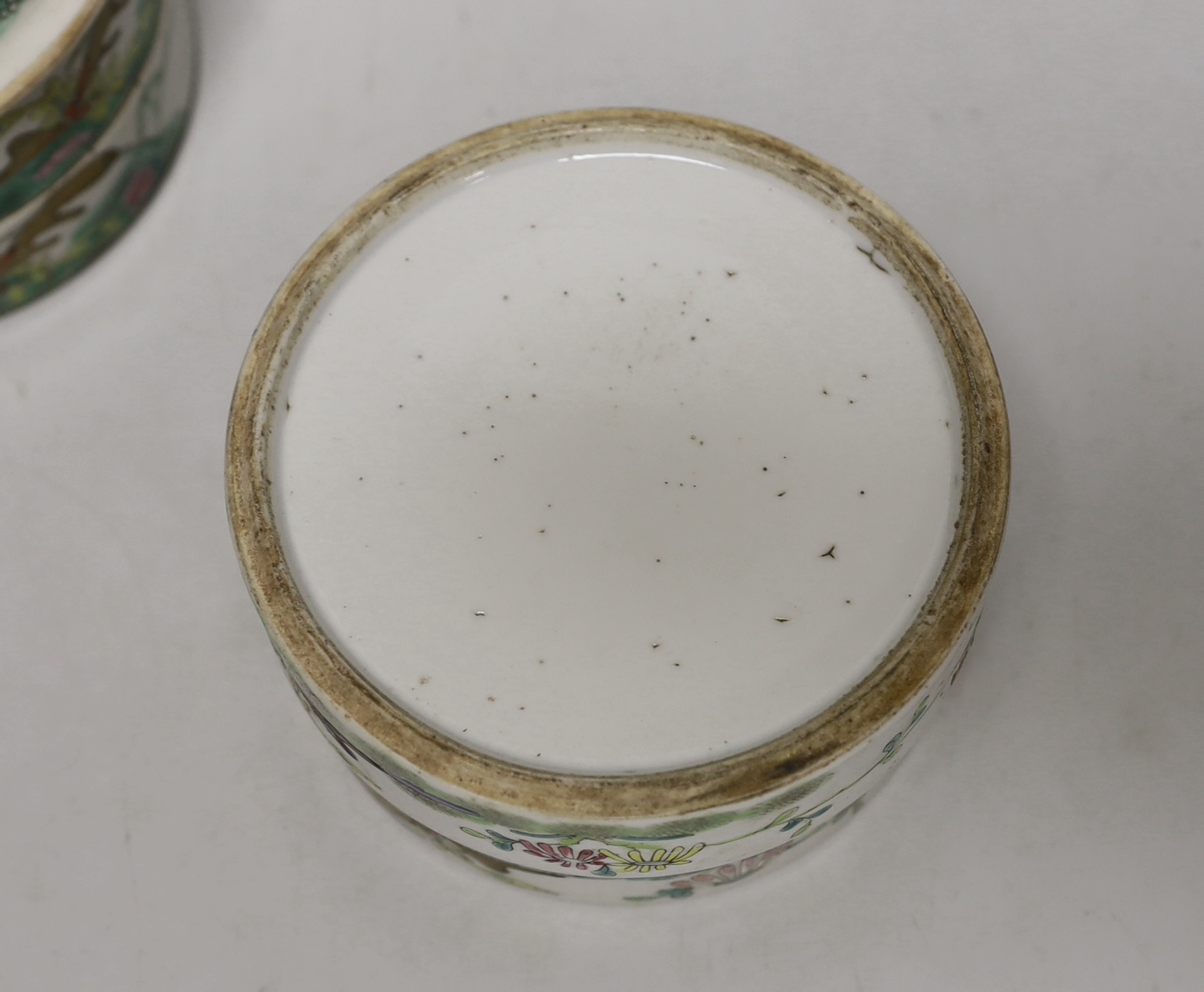 An early 20th century Chinese enamelled porcelain four section stacking food container and cover, 14cm